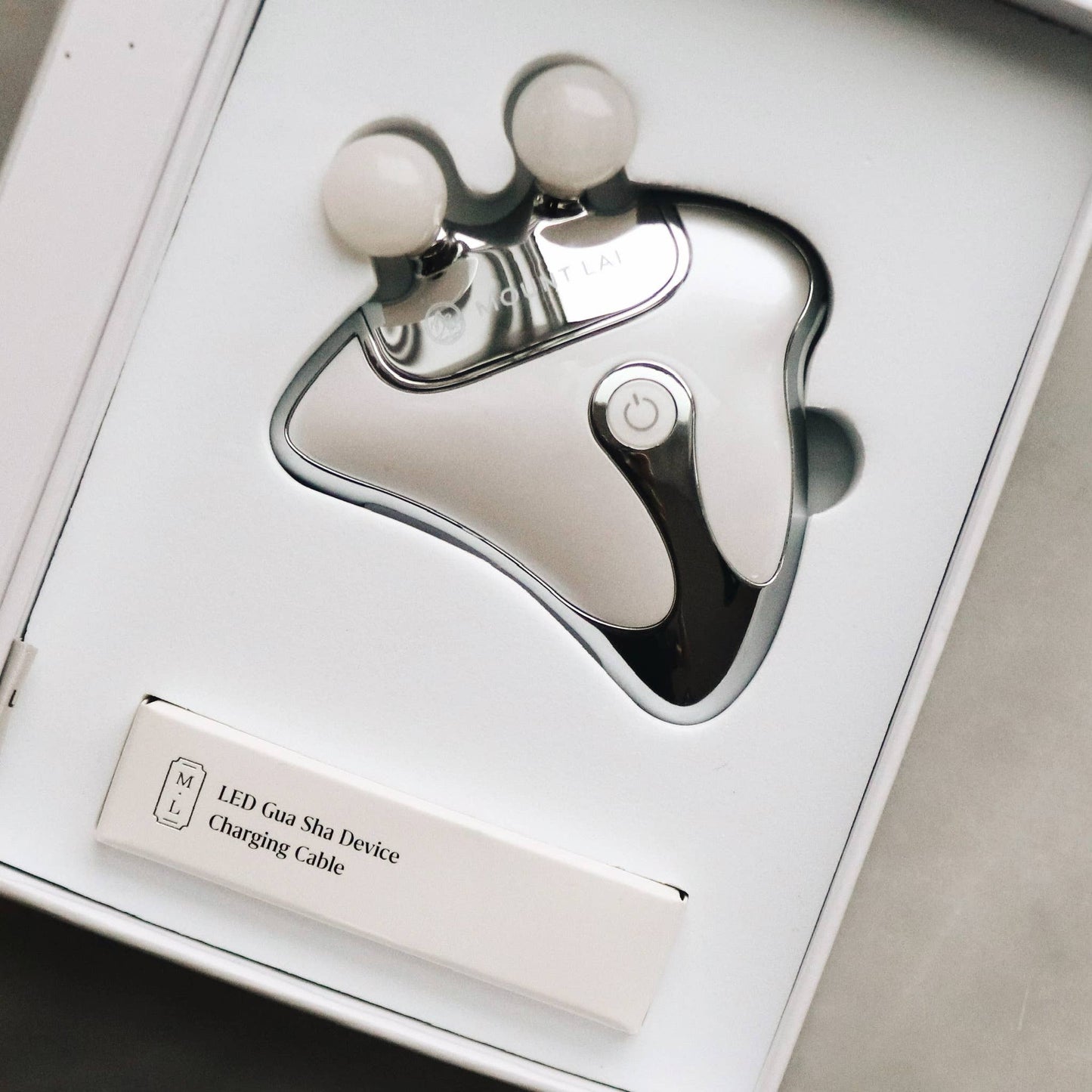 The Vitality Qi LED Gua Sha Device with Protective Pouch